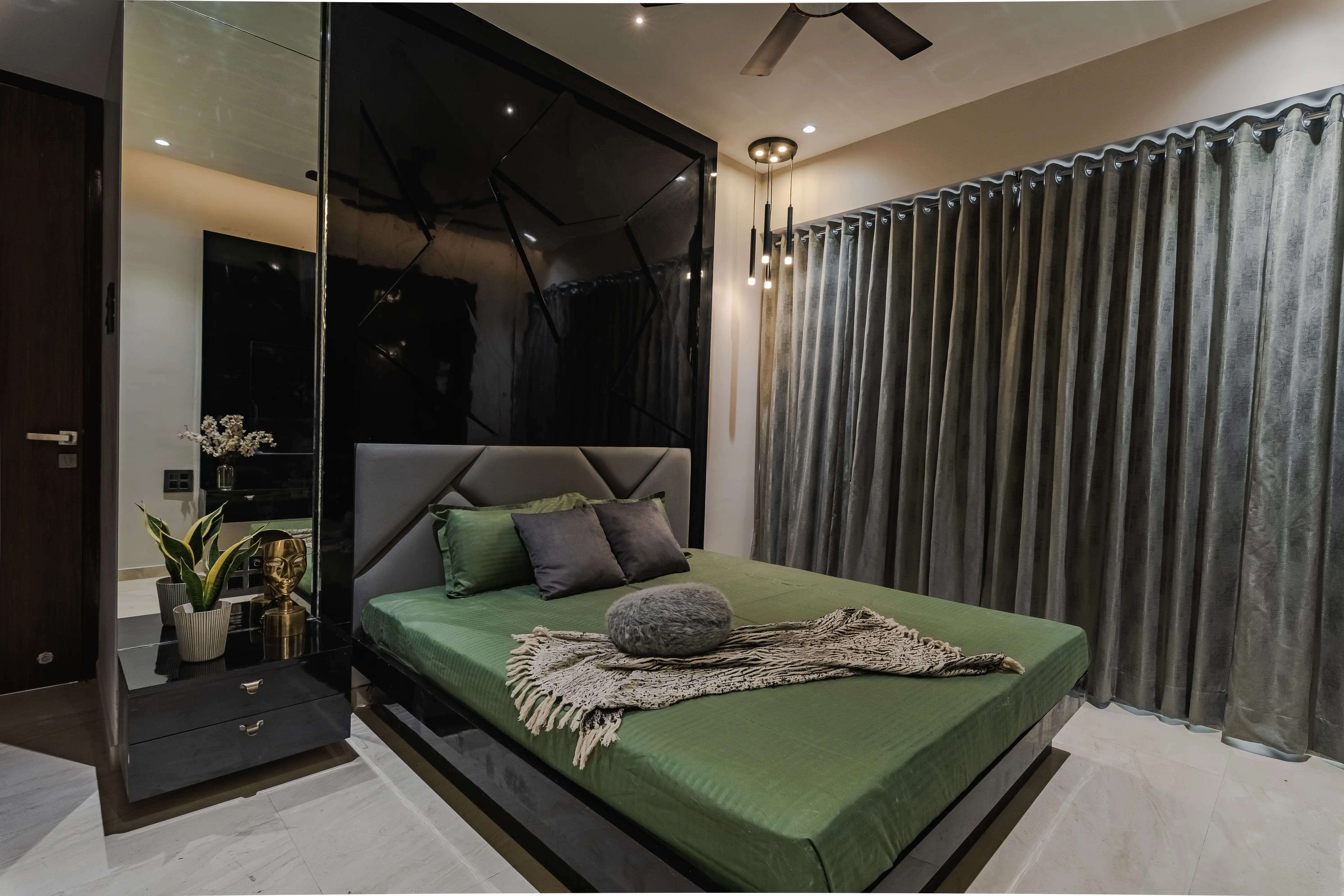 Bedroom retreat with a simple bed frame, nightstand, and mirror for a clean look, interior by Archnine Design Studio