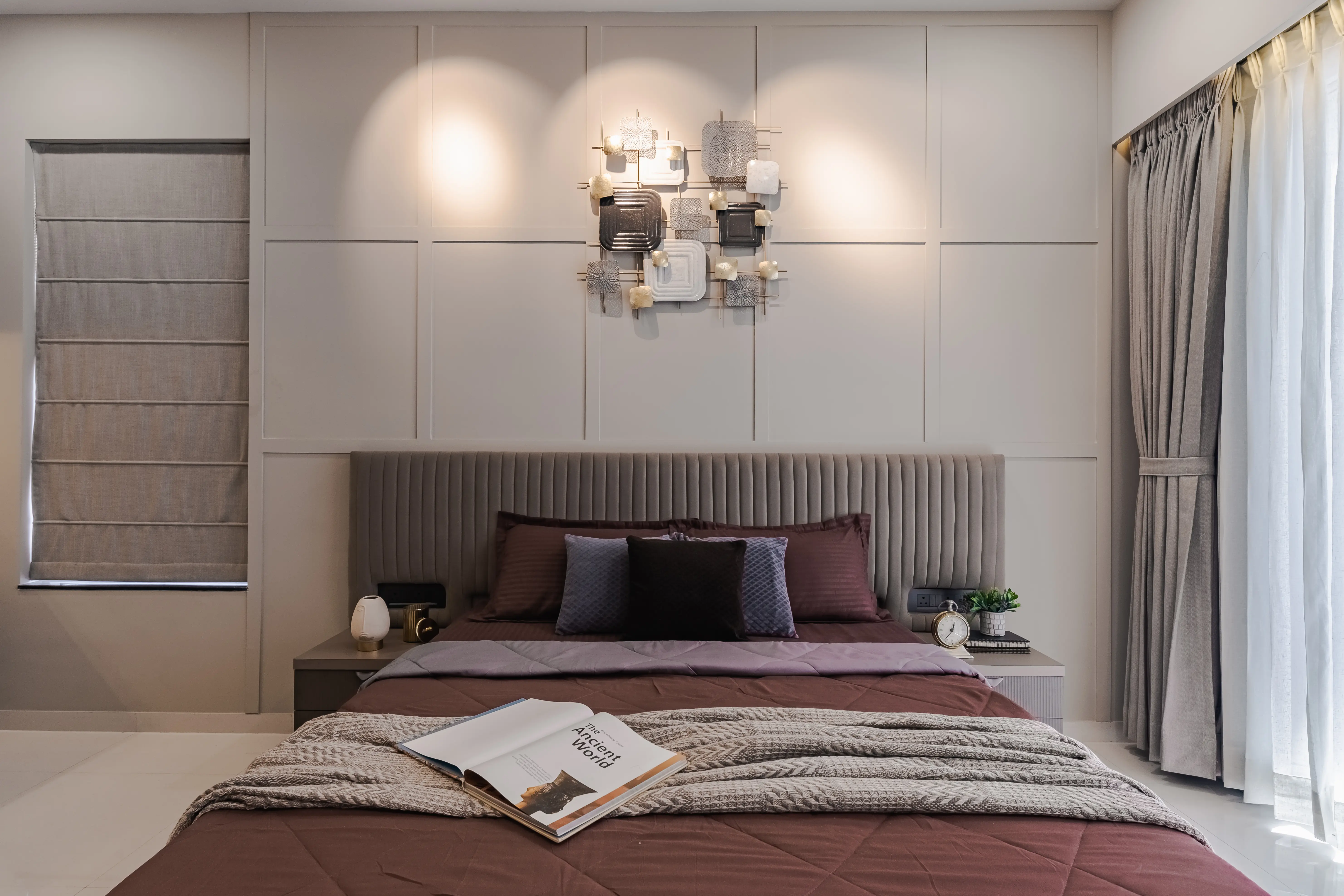 A modern kitchen with a wine cellar and a black and white color scheme, interior by Archnine Design Studio