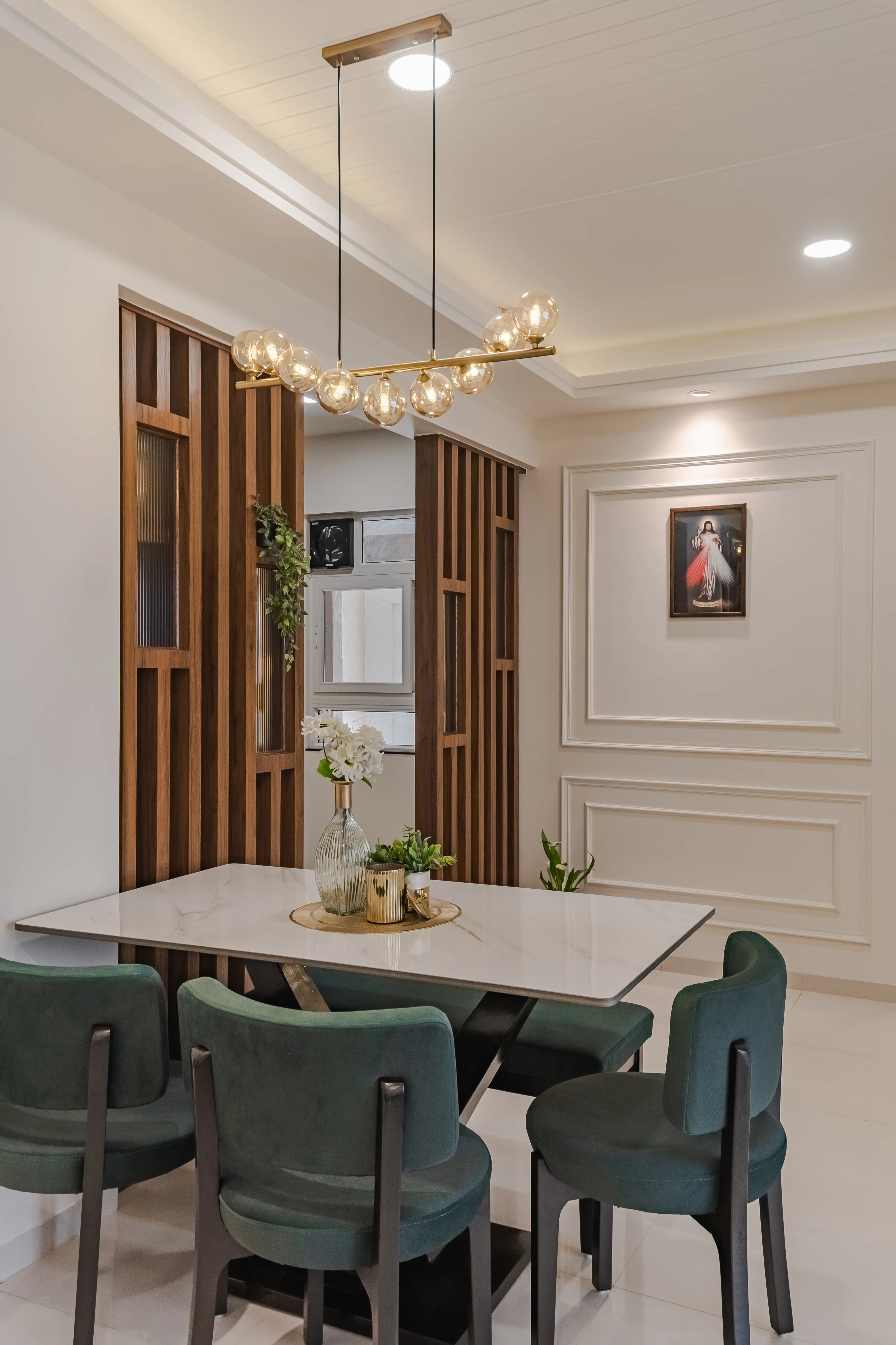 Modern elegance and cozy ambiance converge in this beautifully designed dining area, interior by Archnine Design Studio