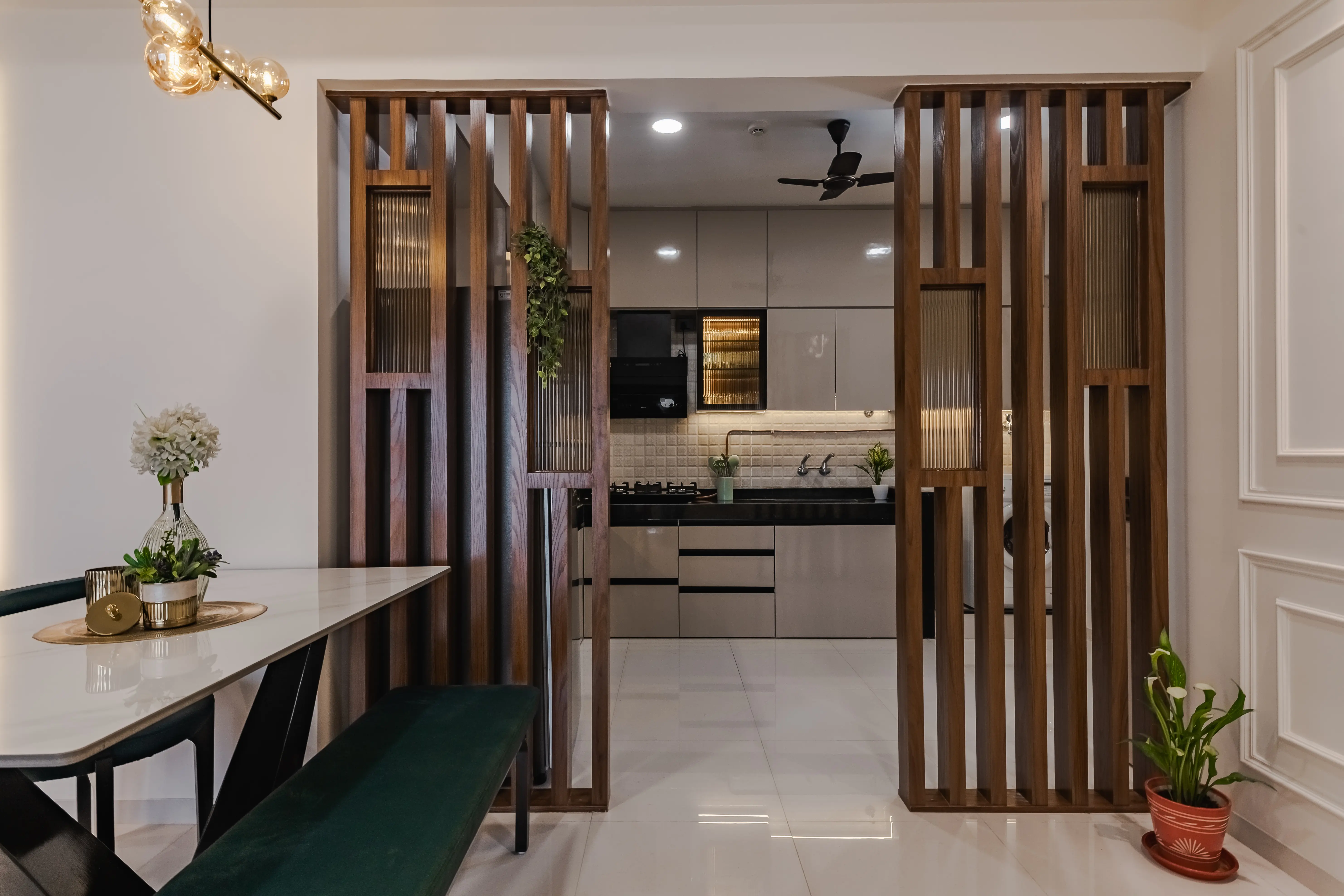 Spacious kitchen with modern appliances and ample counter space, interior by Archnine Design Studio